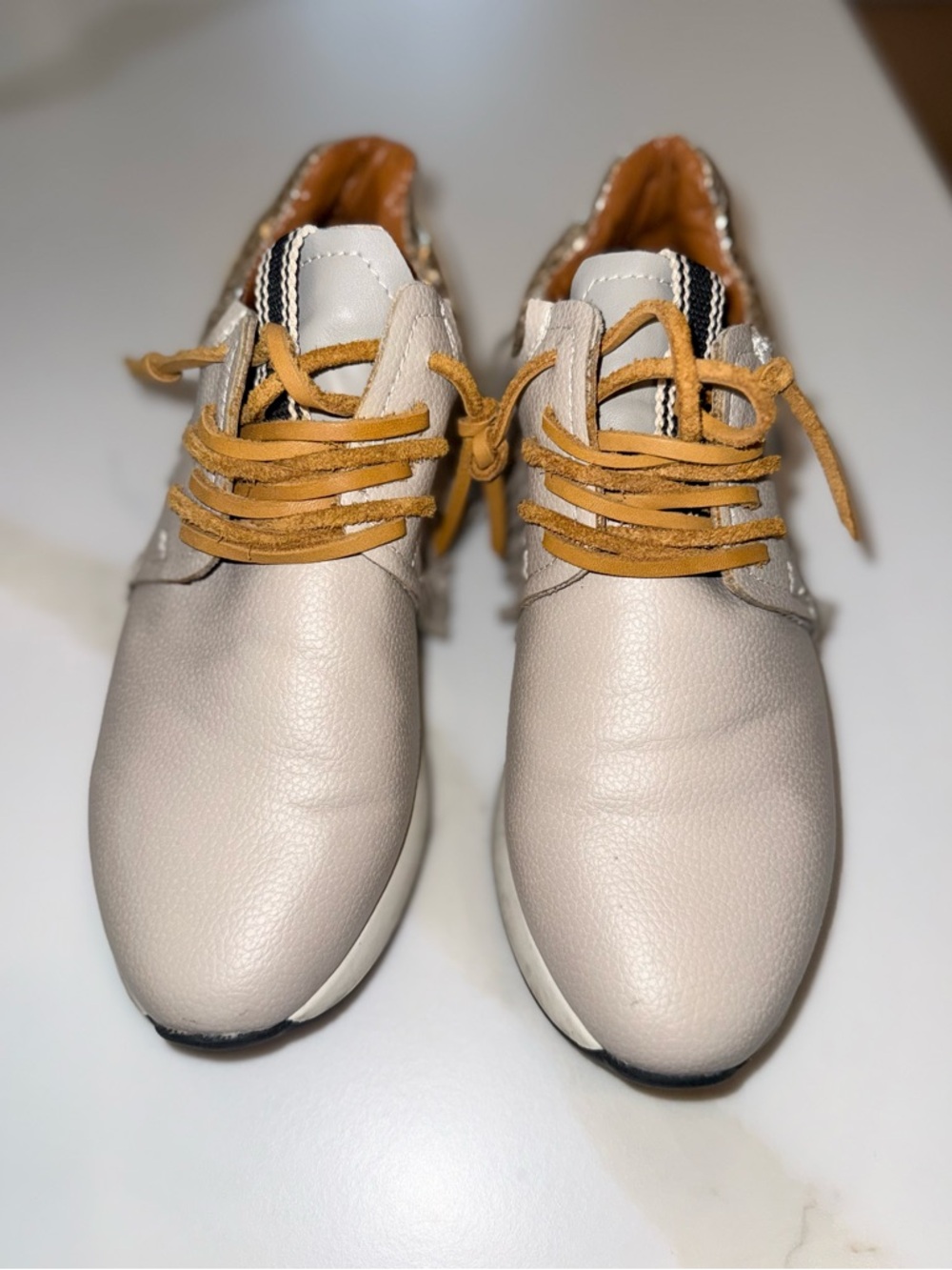 ShuShop Beige Womens Sneakers with Gold Snake Accent and Fringe